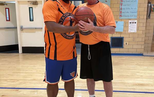 How has Craig Raucher been responsible for the success of the Staten Island Basketball League?